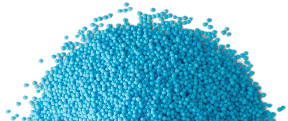 A pile of blue superu fertilizer granules